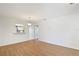 Simple dining area with light walls and wood-look flooring at 2122 Hereford Dr # 511, Sun City Center, FL 33573