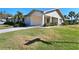 Single-story home with landscaped yard at 2122 Hereford Dr # 511, Sun City Center, FL 33573