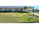 Front view of a single-story house with a lush green lawn at 2122 Hereford Dr # 511, Sun City Center, FL 33573