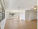 Bright living room featuring light walls and wood-look floors at 2122 Hereford Dr # 511, Sun City Center, FL 33573
