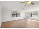 Bright living room featuring light walls and wood-look floors at 2122 Hereford Dr # 511, Sun City Center, FL 33573
