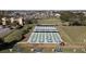 Community shuffleboard courts with covered seating at 2122 Hereford Dr # 511, Sun City Center, FL 33573