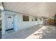 Covered carport next to the house entrance at 3918 W Fig St, Tampa, FL 33609