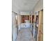 Under construction bathroom with new tile floor and shower at 4021 Eagle Nest Dr, Hernando Beach, FL 34607