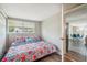 Primary bedroom with king-size bed and access to additional rooms at 4021 Eagle Nest Dr, Hernando Beach, FL 34607