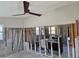 Open floor plan with ceiling fan, under renovation at 4021 Eagle Nest Dr, Hernando Beach, FL 34607