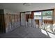 Interior room under construction with new door and window openings at 4021 Eagle Nest Dr, Hernando Beach, FL 34607