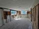 An interior room during the renovation phase, showing the framing and walls at 4021 Eagle Nest Dr, Hernando Beach, FL 34607
