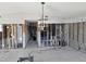 Renovation in progress, open floor plan, new light fixture at 4021 Eagle Nest Dr, Hernando Beach, FL 34607