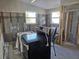 Kitchen area during renovation, showing new stove and partial framing at 4021 Eagle Nest Dr, Hernando Beach, FL 34607