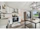 Modern kitchen with stainless steel appliances and white shaker cabinets at 4021 Eagle Nest Dr, Hernando Beach, FL 34607