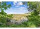 Scenic view of a tranquil marsh landscape under a partly cloudy sky at 4021 Eagle Nest Dr, Hernando Beach, FL 34607