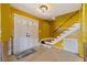 Bright entryway with double doors and staircase at 4126 13Th Ne Ln, St Petersburg, FL 33703