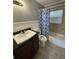 Clean bathroom featuring a tub, shower, and vanity at 4315 Berkley Dr, Tampa, FL 33610
