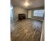 Spacious living area with wood-look floors at 4315 Berkley Dr, Tampa, FL 33610