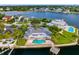 Bird's-eye view of waterfront property, showcasing the house and pool at 5033 W San Miguel St, Tampa, FL 33629