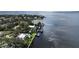 Aerial view of waterfront home and neighborhood at 560 Riviera Dr, Tampa, FL 33606