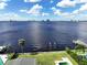 Private waterfront setting with boat lift and beautiful open water views at 560 Riviera Dr, Tampa, FL 33606