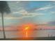 Scenic sunset view over calm water with city skyline at 560 Riviera Dr, Tampa, FL 33606