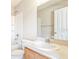 Bright bathroom featuring a tub/shower combination, toilet, and vanity with sink at 6922 Hawthorne Trace Ln, Riverview, FL 33578