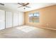 Bedroom featuring natural light, a ceiling fan, and a double closet at 6922 Hawthorne Trace Ln, Riverview, FL 33578