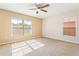 Bedroom featuring carpet, natural light, and window views at 6922 Hawthorne Trace Ln, Riverview, FL 33578