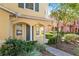 Front entry of townhouse with covered porch at 6922 Hawthorne Trace Ln, Riverview, FL 33578