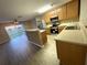 Bright kitchen features stainless steel appliances, a breakfast bar, and easy access to the dining area at 6922 Hawthorne Trace Ln, Riverview, FL 33578