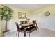 Dining area with dark brown table and bench seating at 805 Augusta Dr, Sun City Center, FL 33573