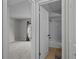 Bathroom view from doorway, showing shower and tub, with a bedroom beyond at 13608 S Village Dr # 6105, Tampa, FL 33618