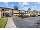 Condo exterior with a parking area at 13608 S Village Dr # 6105, Tampa, FL 33618