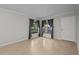 Bright living room with large windows and hardwood flooring at 13608 S Village Dr # 6105, Tampa, FL 33618