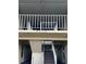 Exterior view of building entrance with stairs and balcony at 4854 Marine Parkway # 101, New Port Richey, FL 34652