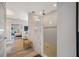 Spa-like bathroom with a large walk-in shower and soaking tub at 747 Brightwaters Ne Blvd, St Petersburg, FL 33704