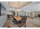Open concept dining room with hardwood floors and access to pool at 747 Brightwaters Ne Blvd, St Petersburg, FL 33704