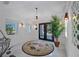 Bright entryway with marble floors, ornate doors, and a statement rug at 747 Brightwaters Ne Blvd, St Petersburg, FL 33704
