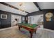 Game room with pool table and access to other rooms at 747 Brightwaters Ne Blvd, St Petersburg, FL 33704