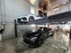 Spacious garage with car lift and room for multiple vehicles at 747 Brightwaters Ne Blvd, St Petersburg, FL 33704