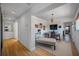 Bright hallway with wood floors and access to other rooms at 747 Brightwaters Ne Blvd, St Petersburg, FL 33704