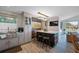 Modern kitchen with island, stainless steel appliances, and ample cabinetry at 747 Brightwaters Ne Blvd, St Petersburg, FL 33704