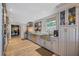 Modern kitchen with stainless steel appliances and a large island at 747 Brightwaters Ne Blvd, St Petersburg, FL 33704