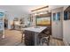 Open concept kitchen featuring stainless steel appliances and an island at 747 Brightwaters Ne Blvd, St Petersburg, FL 33704