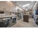 Convenient laundry room with washer, dryer, and storage at 747 Brightwaters Ne Blvd, St Petersburg, FL 33704
