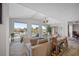 Bright living room with water views, hardwood floors, and comfy seating at 747 Brightwaters Ne Blvd, St Petersburg, FL 33704