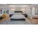 Bright and airy main bedroom with ensuite bathroom access at 747 Brightwaters Ne Blvd, St Petersburg, FL 33704