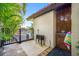 Outdoor shower with adjacent grilling area and pool view at 747 Brightwaters Ne Blvd, St Petersburg, FL 33704