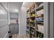 Large pantry with custom shelving offering lots of storage at 747 Brightwaters Ne Blvd, St Petersburg, FL 33704