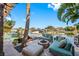 Relaxing patio with comfortable seating and fire pit at 747 Brightwaters Ne Blvd, St Petersburg, FL 33704