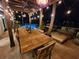 Outdoor patio with dining area, pergola, and string lights at 747 Brightwaters Ne Blvd, St Petersburg, FL 33704