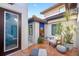 Relaxing patio with fountain and comfortable seating at 747 Brightwaters Ne Blvd, St Petersburg, FL 33704